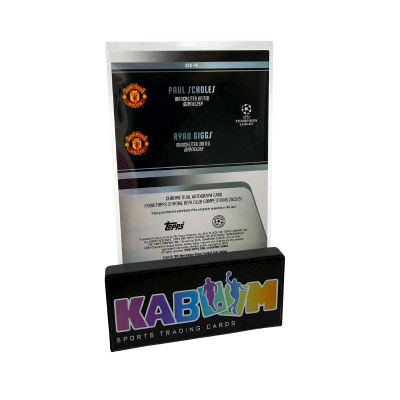 A collectible sports trading card display plaque featuring a Paul Scholes and Ryan Giggs Manchester United autograph card mounted in a clear acrylic stand on a black base with the KABIDIM Sports Trading Cards logo.