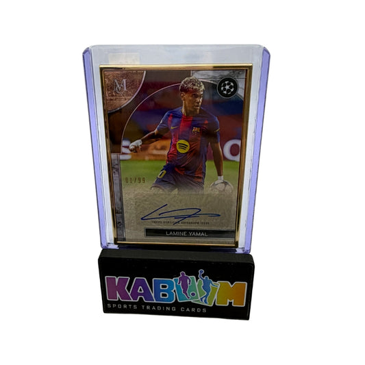 A collectible soccer trading card displayed in a clear acrylic case on a black branded base. The card features Lamine Yamal of FC Barcelona, with a visible signature and a Champions League Champions badge.
