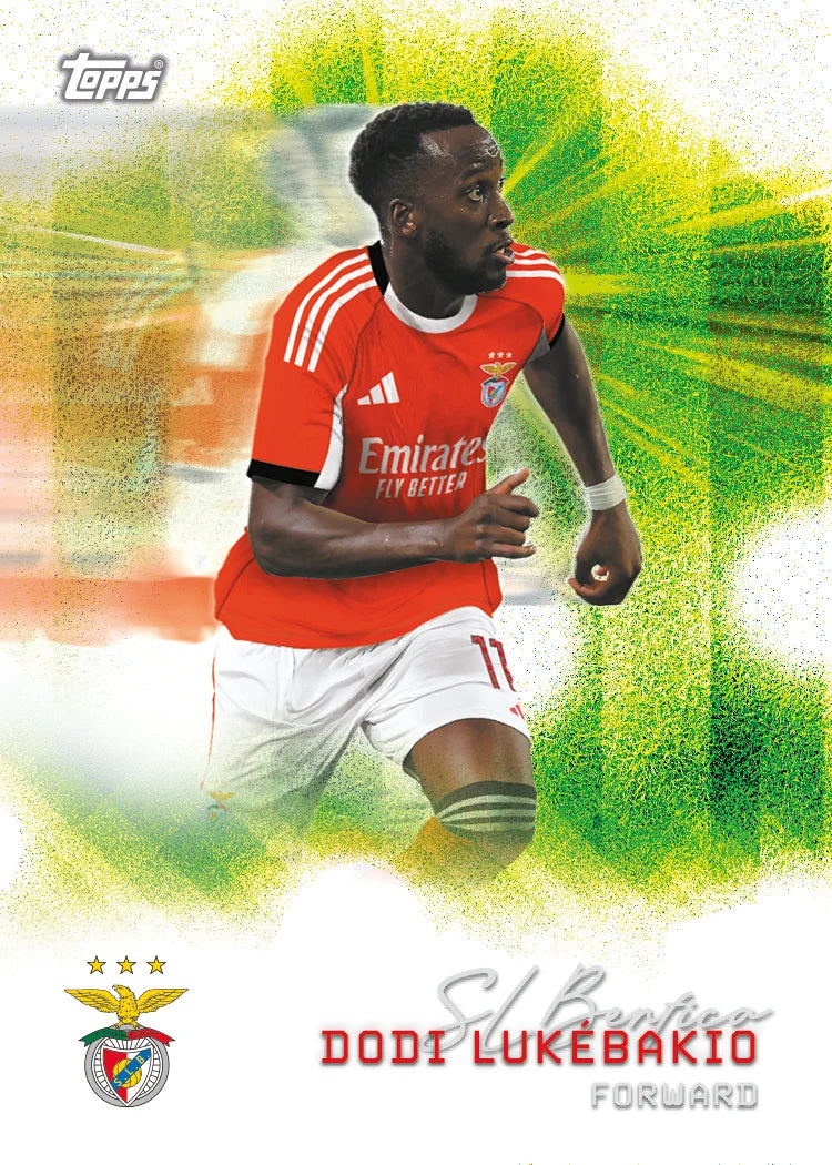 Topps soccer trading card featuring footballer Dodi Lukebakio in a red and white Benfica jersey, with a green and yellow textured background and player details printed at the bottom.