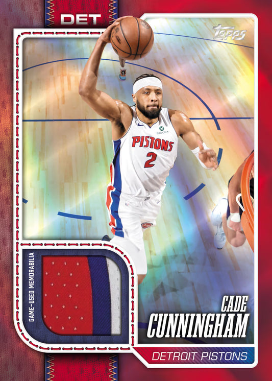 A Topps trading card featuring Detroit Pistons player Cade Cunningham in a white jersey number 2, with a game-used fabric swatch embedded in the lower left corner. The card has a red border and a colorful basketball-court background.